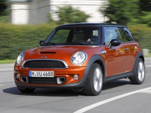 28 girls cram into a Mini for world record