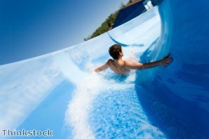 Couple have sex on top of water slide