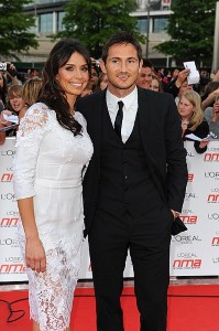 Lampard cuddles up with Christine Bleakley on holiday