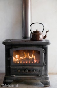 Man installs wood burning stove in car